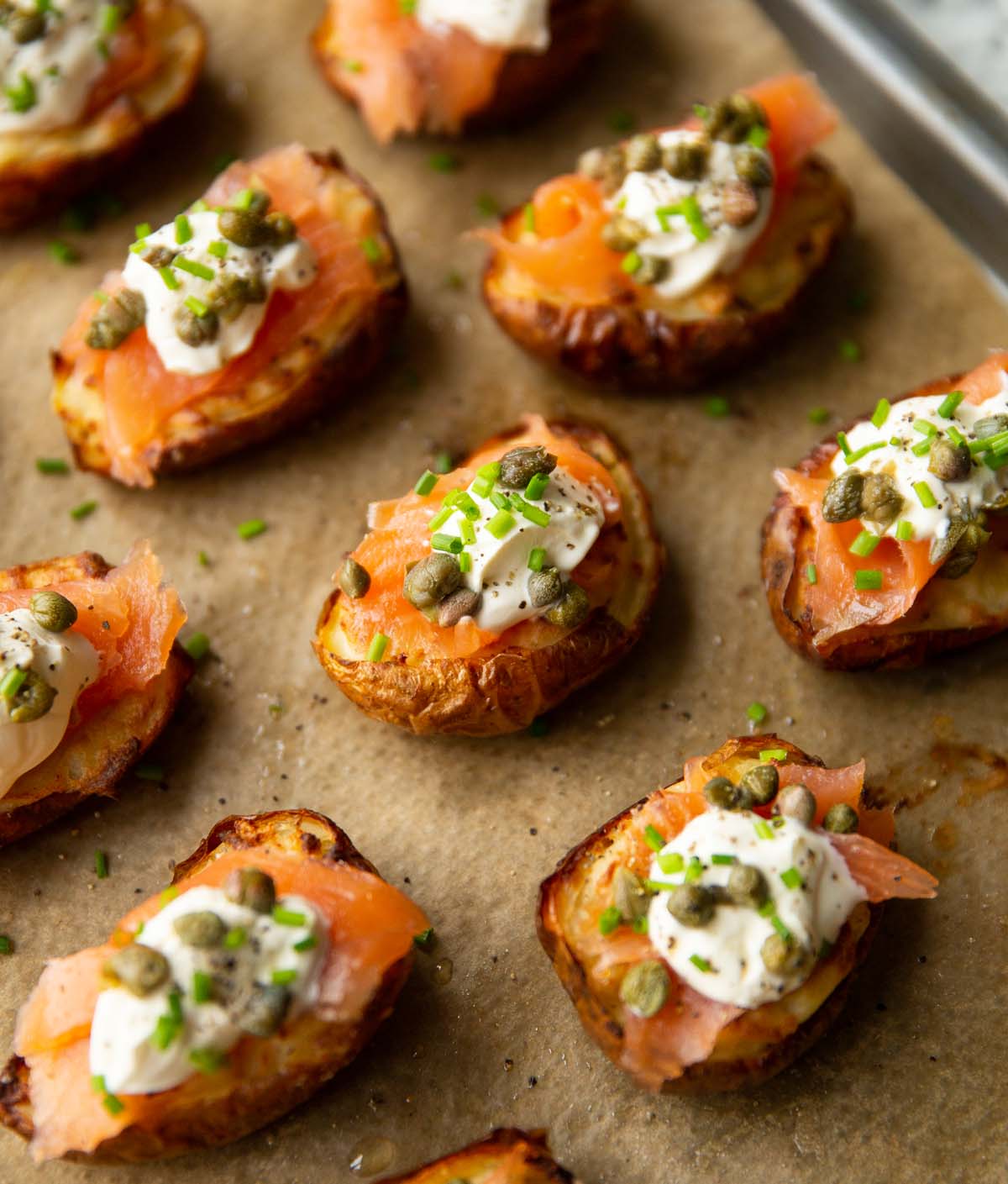 salmon twice baked potatoes on baking tray with baking paper